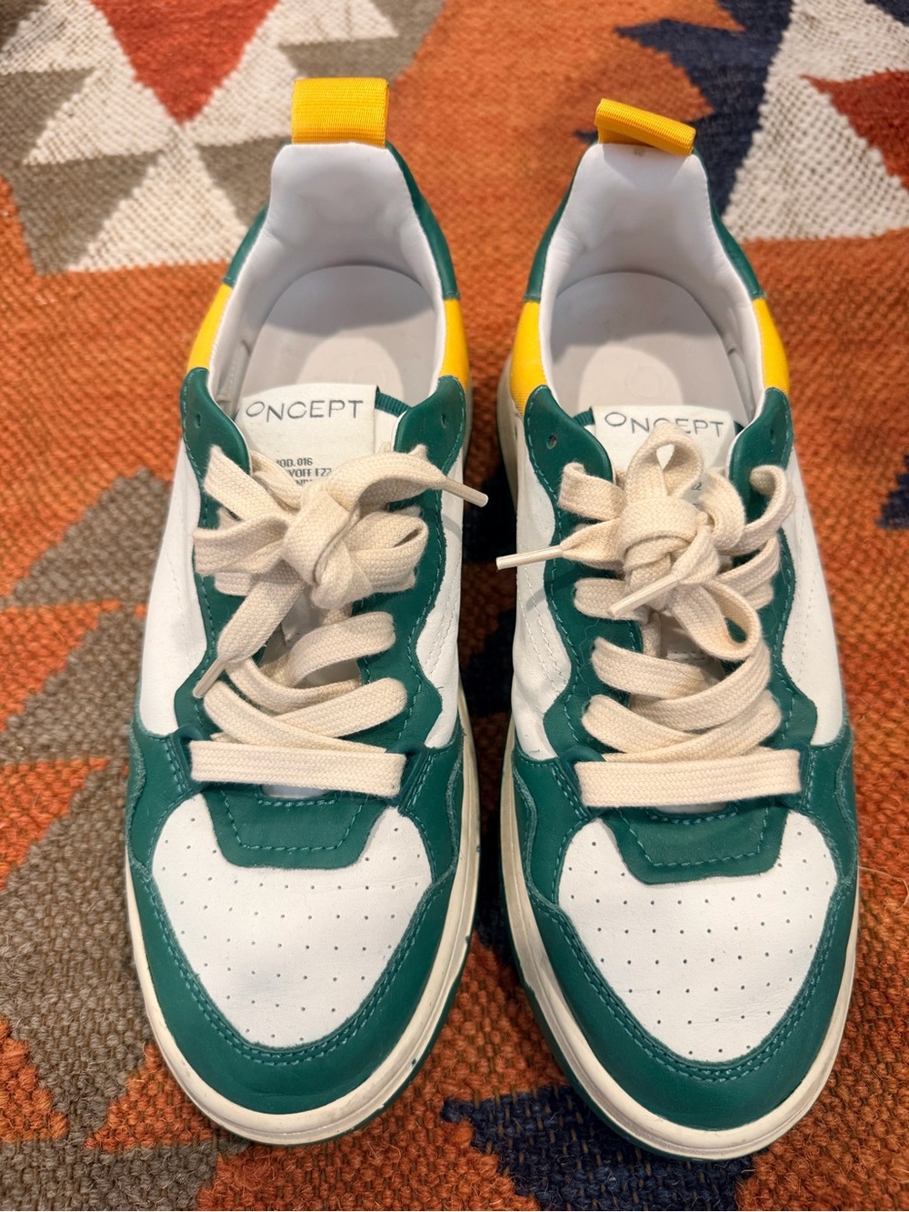 Oncept Women's White and Green Low-Top Sneakers with Yellow Accent